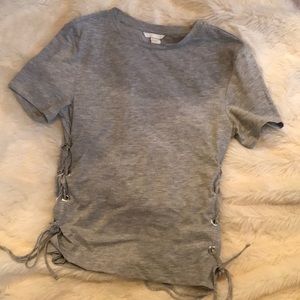 H&M XS T-shirt with grommets on side!